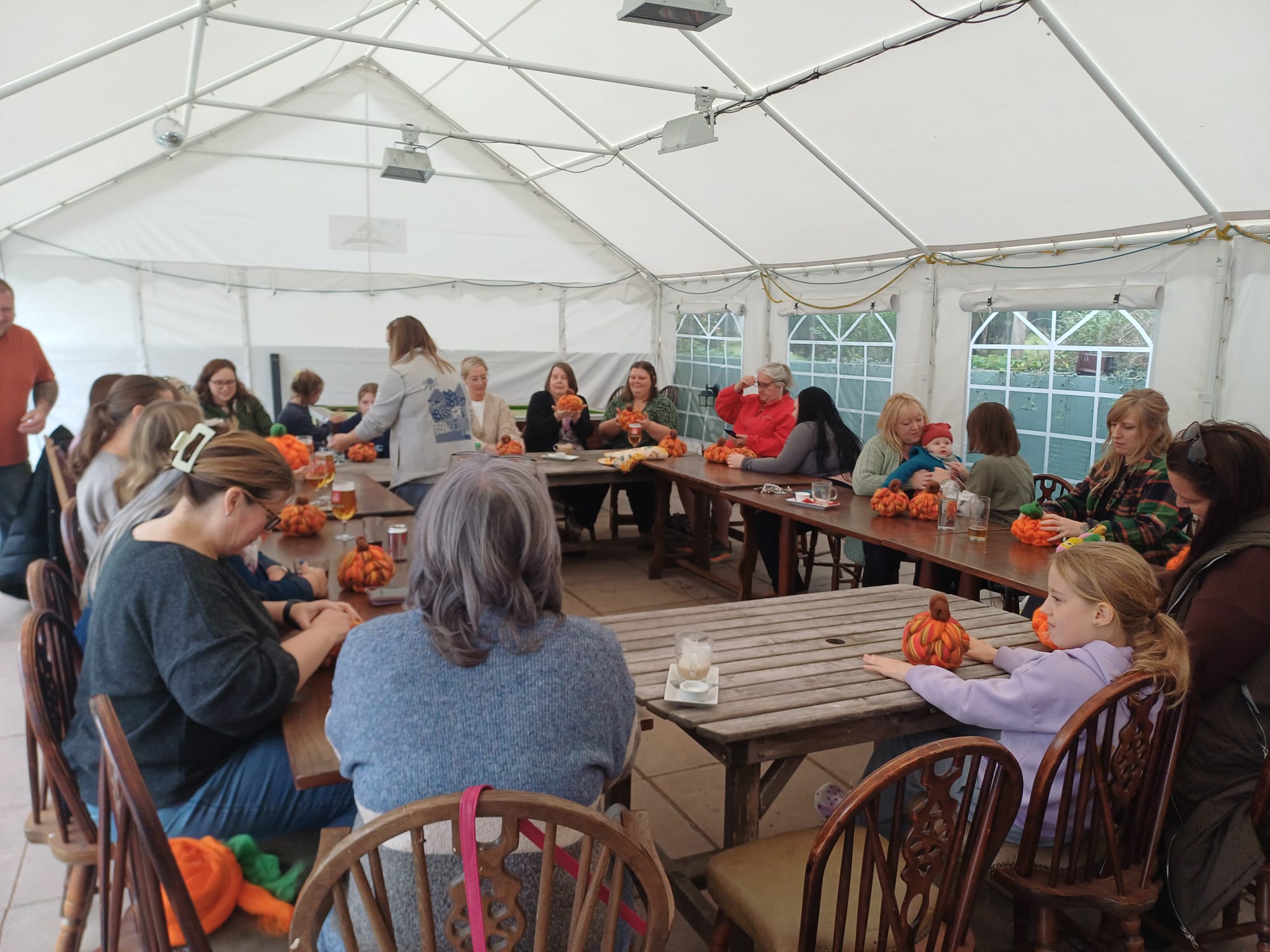An evening gathering in the marquee at The Halfway