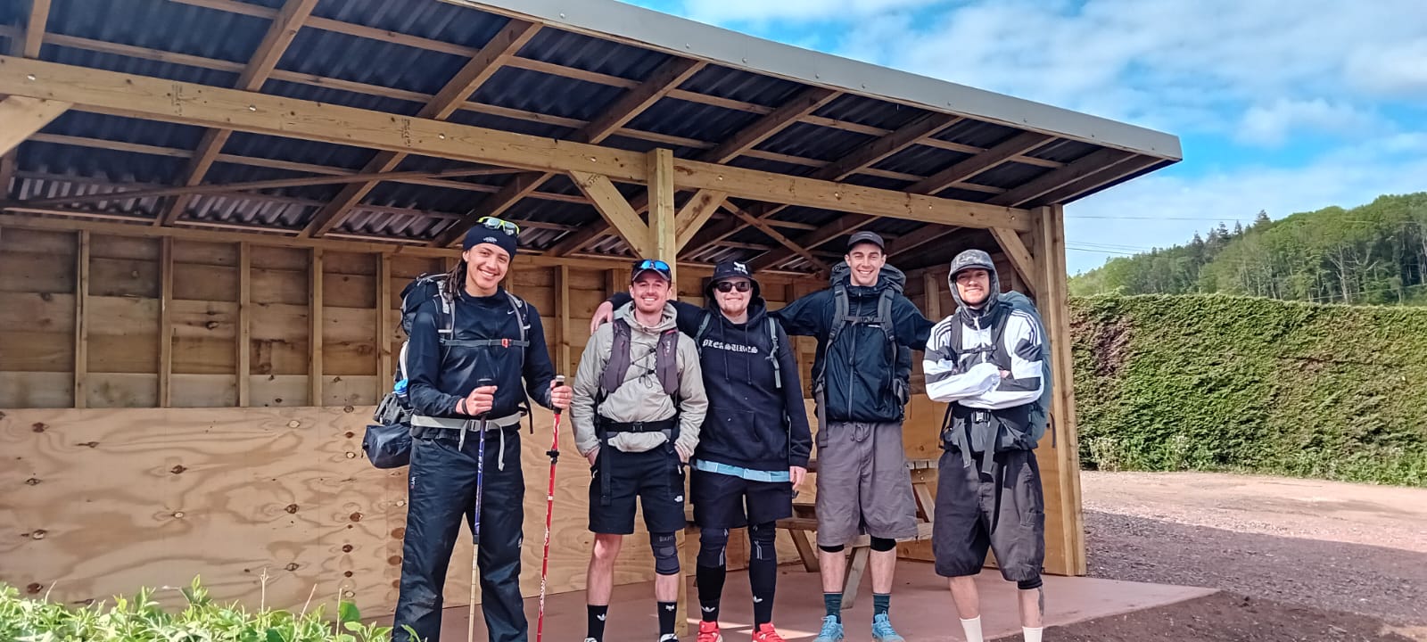 Walkers stopping at the outdoor shelter at The Halfway